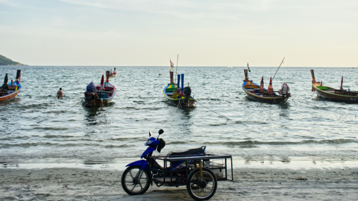 A view of beach in the Phuket, Thailand during sunset