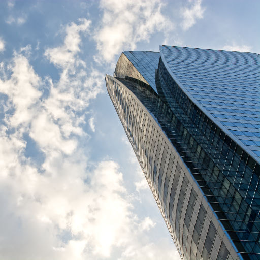 Sky scrapper located in the Sathorn, Bangkok with clear blue sky